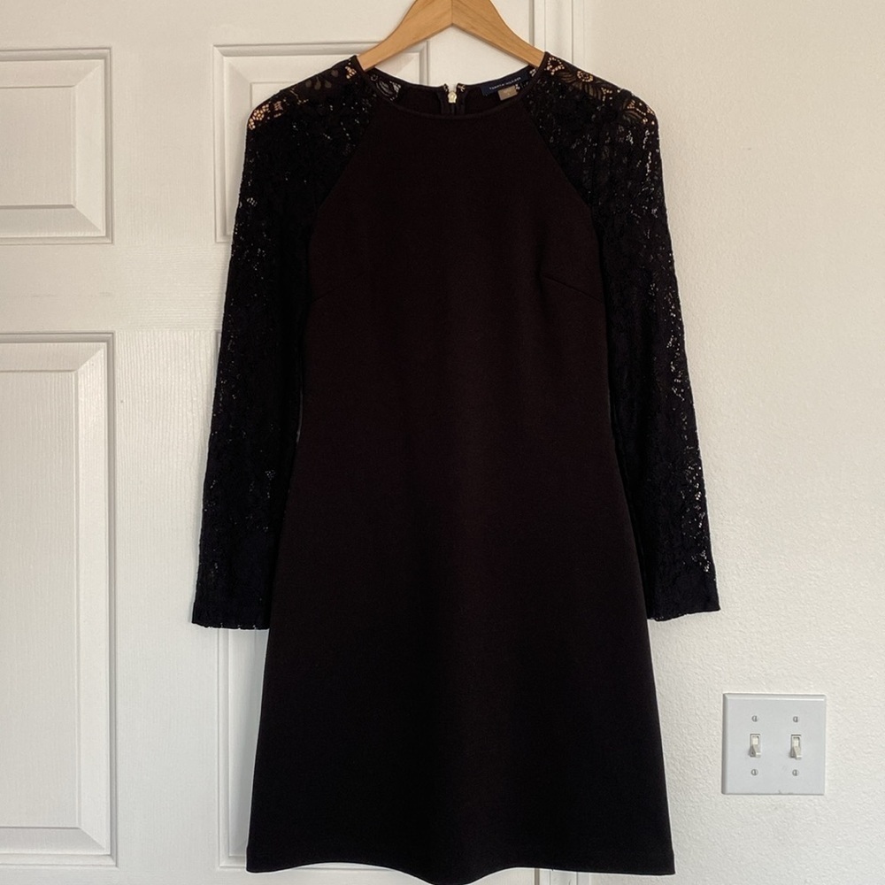 Tommy Hilfiger little black dress with long sleeves lace sleeves.